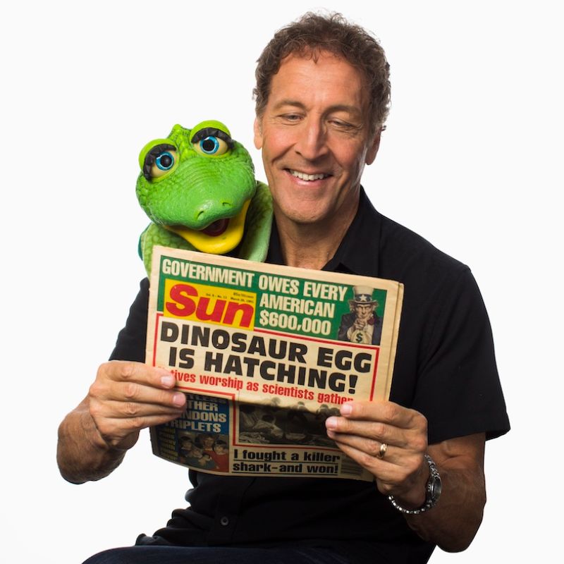 Brad Cummings and Rex Reading Newspaper